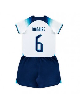 Otroški Nogometna dresi replika Anglija Harry Maguire #6 Domači SP 2022 Kratek rokav (+ hlače)